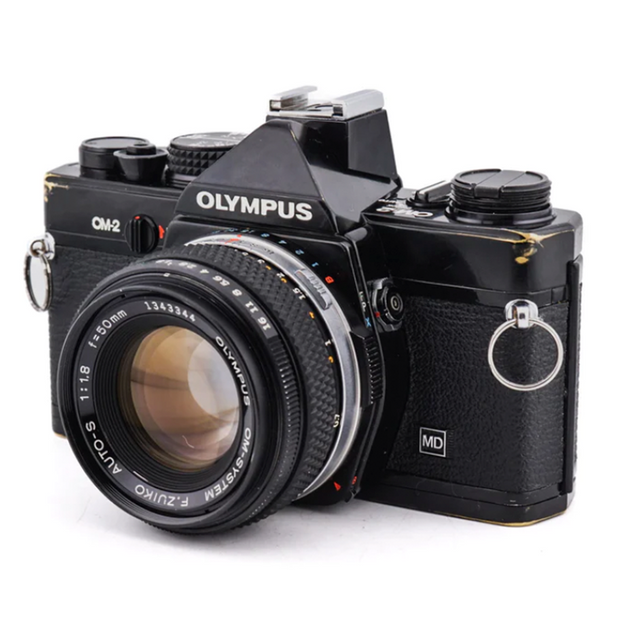 Olympus OM-2 + 50mm f1.8 F.Zuiko Auto-S - Cámara Vintage SLR de 35mm de segunda mano en Camera Market
