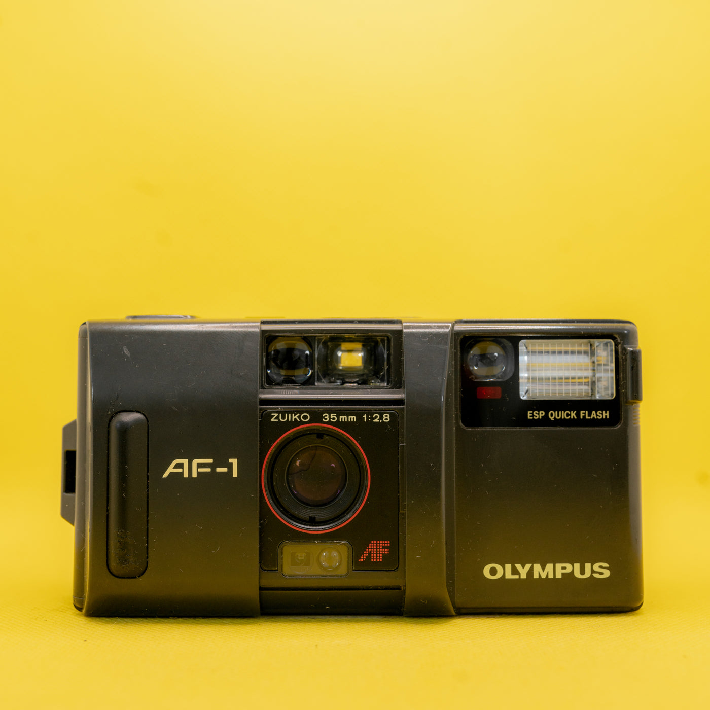Olympus AF-1 - 35mm Premium Filmcamera (Zuiko 2.8) · hoofdafbeelding